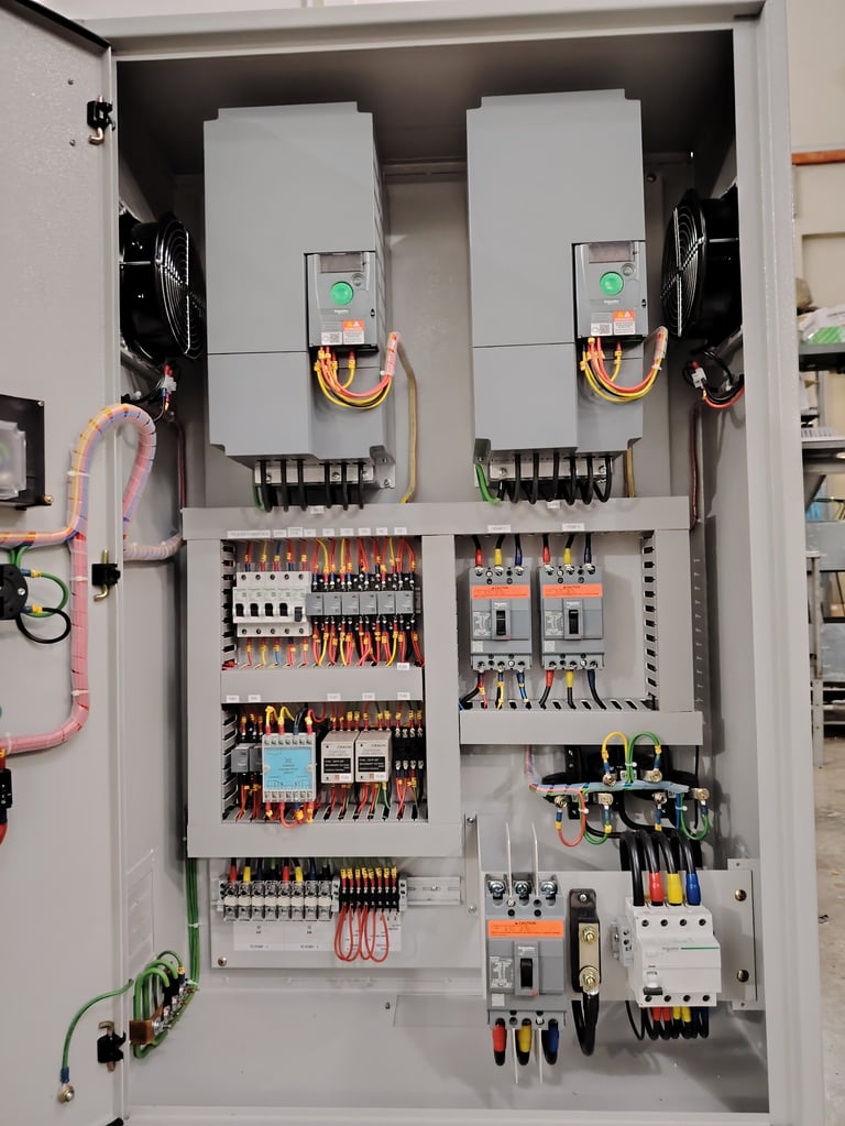 Professional Electrical Distribution Board Featuring Variable Speed Drives Modules and Organized Terminal Wiring