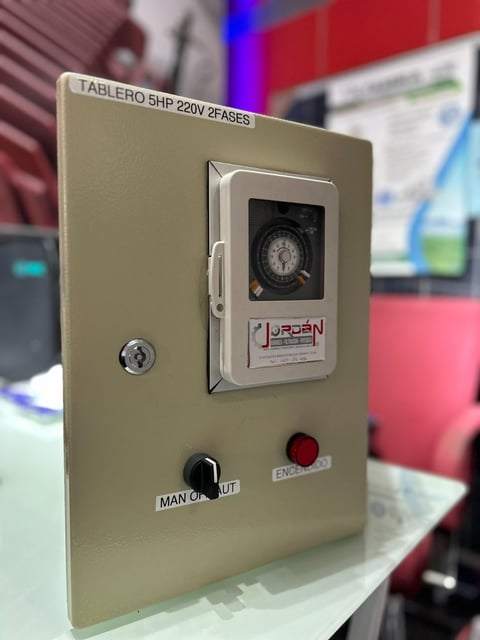 Beige control panel with labeled timer dial and manual shut button, showing 5HP 220V 2-phase specifications